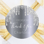 Thank You silver drips birthday Classic Round Sticker<br><div class="desc">A trendy and glamorous birthday party. A faux silver looking background decorated with faux silver glitter drips,  paint dripping look.  Personalize and add a date and name.  The text: Thank You is written with a modern hand lettered style script. Perfect for favors and thank you cards.</div>