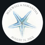 Thank You Sticker Blue Starfish Beach Wedding<br><div class="desc">Personalized Starfish Beach Wedding Stickers with bride's and groom's names and wedding date features watercolor artwork in shades of blue. Use them for wedding favors and gifts. Visit www.zazzle.com/dotellabelle to see them all.

Unique art and design by Victoria Grigaliunas of Do Tell A Belle.</div>