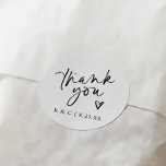 Thank You Stickers for Wedding Favors Modern Heart<br><div class="desc">These Modern Thank You Wedding Favor Stickers are designed in a stylish round shape, featuring elegant modern handwriting with a small heart. Personalized with the couple's initials and wedding date, they add a chic and thoughtful touch to any wedding favor. Perfect for a sleek, modern look that makes your thank-you...</div>