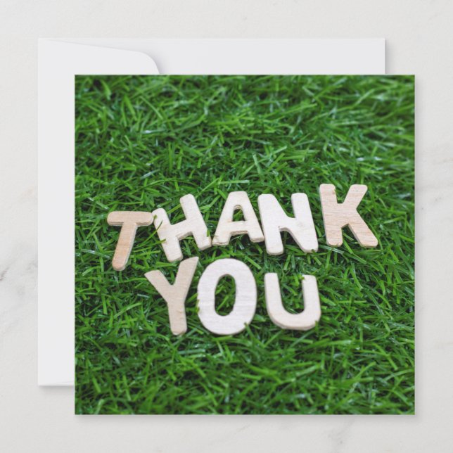Thank you word on green grass background card (Front)