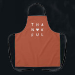 Thankful Modern Thanksgiving Terracotta Apron<br><div class="desc">// Need help customizing your design? Got other ideas? Feel free to contact me (Zoe) directly.

// Background color can be changed to match your theme.</div>