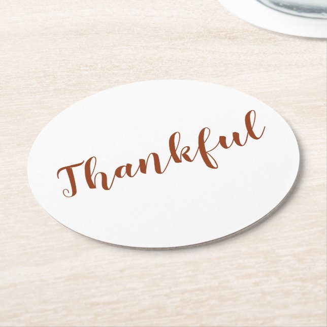 Thankful rust cinnamon white script thanksgiving round paper coaster (Angled)