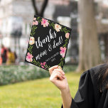 Thanks Mom & Dad | Custom School and Class Year Graduation Cap Topper<br><div class="desc">Cute personalized grad cap topper features your school and class year with "thanks mom and dad!" or your message of choice,  in white brush script lettering on a black background adorned with pink watercolor flowers and green foliage.</div>