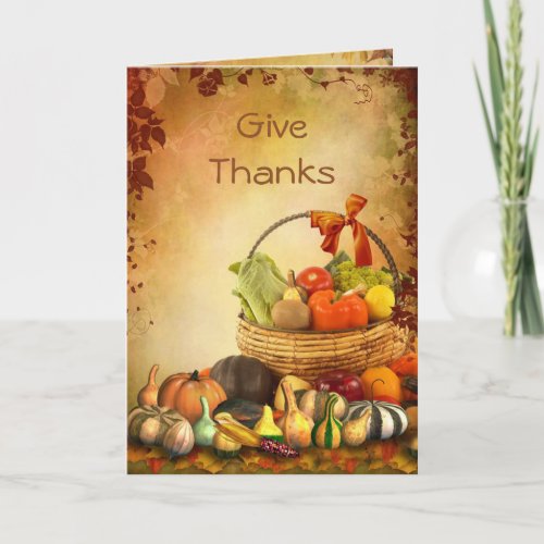 Thanksgiving basket with autumn harvest holiday card
