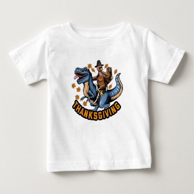 Thanksgiving holiday turkey riding a tyrannosaurus baby T-Shirt (Front)
