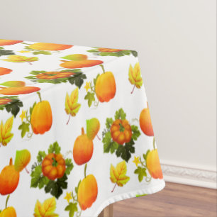 Thanksgiving Pumpkins & Fall Leaves on White Tablecloth