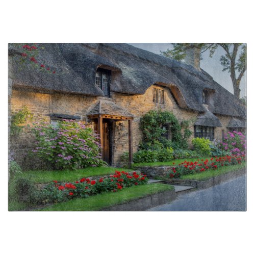 Thatch roof cottage in England Cutting Board