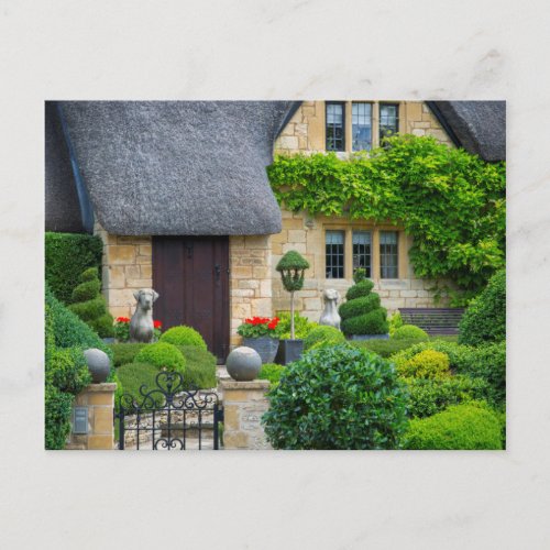 Thatched roof cottage postcard