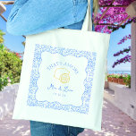 That's Amore Personalized Amalfi Coast Wedding Tote Bag<br><div class="desc">Welcome your guests in style with our customizable "That's Amore" wedding tote bags. Featuring a playful lemon design with soft blue accents, these elegant totes are perfect for holding wedding favors, programs, or gifts for your guests. Personalized with your names and wedding date, they bring a charming Mediterranean touch to...</div>