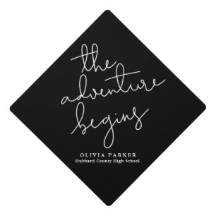 The Adventure Begins Black and White Typography Graduation Cap Topper