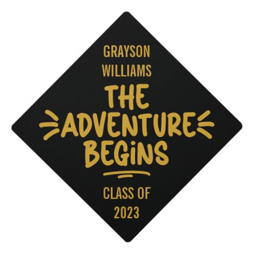 The Adventure Begins Black Gold Typography Graduation Cap Topper