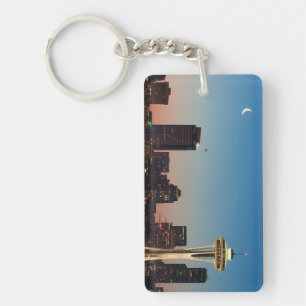 The American flag flies between the rising moon Keychain