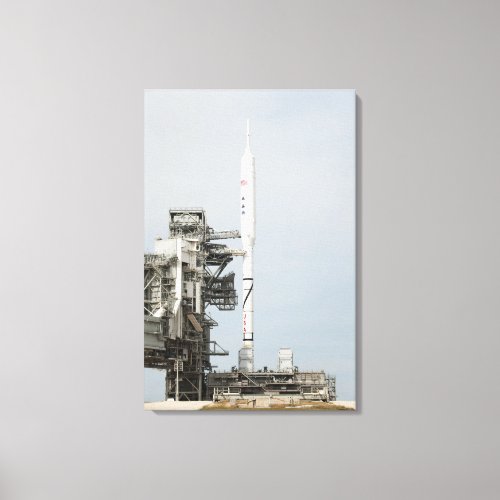 The Ares I_X rocket is seen on the launch pad Canvas Print