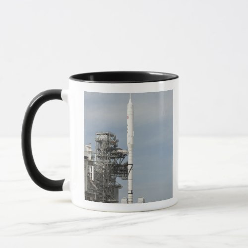 The Ares I_X rocket is seen on the launch pad Mug