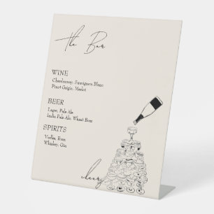 The Bar with Champagne Tower Pedestal Sign