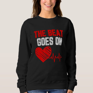 The beat goes on Heart Disease awareness red heart Sweatshirt