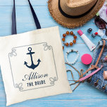 The Bride Navy Nautical Anchor Custom Wedding Tote Bag<br><div class="desc">Custom wedding tote bag features a navy blue boat anchor,  decorative nautical rope frame,  and  elegant custom text that can be personalized with the name and role of the person in your bridal party.</div>
