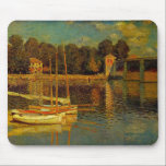 The Bridge at Argenteuil by Claude Monet Mouse Pad<br><div class="desc">The Bridge at Argenteuil (1874) by Claude Monet is a vintage impressionist fine art painting featuring sailboats on the Seine River at Argenteuil, northwest of Paris, France. About the artist: Claude Monet (1840-1926) was a founder of the French impressionist painting movement with most of his paintings being "en plein air"...</div>