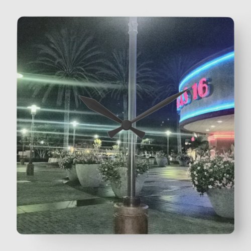 The Bright Lights of the Movie Theater at Night Square Wall Clock