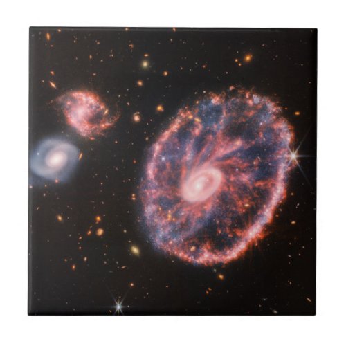 The Cartwheel Galaxy And Its Companion Galaxies Ceramic Tile