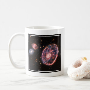 The Cartwheel Galaxy And Its Companion Galaxies. Coffee Mug