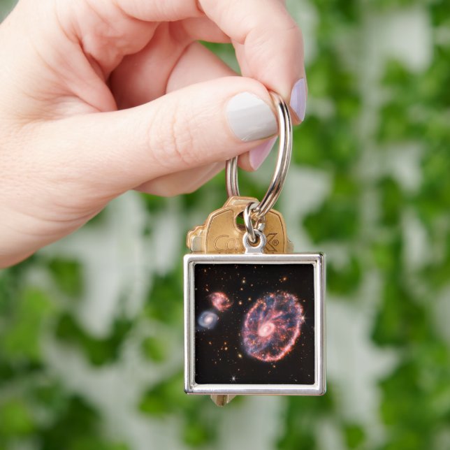 The Cartwheel Galaxy And Its Companion Galaxies. Keychain (Hand)