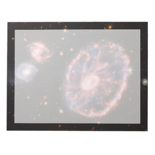 The Cartwheel Galaxy And Its Companion Galaxies. Notepad