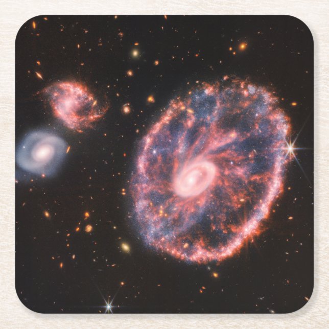 The Cartwheel Galaxy And Its Companion Galaxies. Square Paper Coaster (Front)