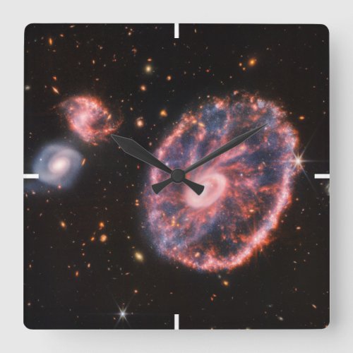 The Cartwheel Galaxy And Its Companion Galaxies Square Wall Clock