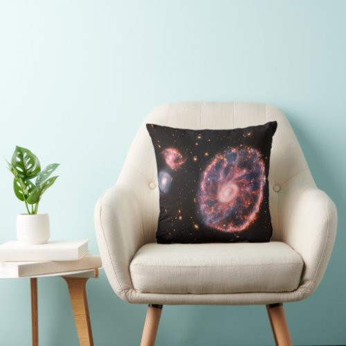 The Cartwheel Galaxy And Its Companion Galaxies Throw Pillow