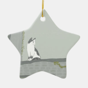 The cat on the fence ceramic ornament