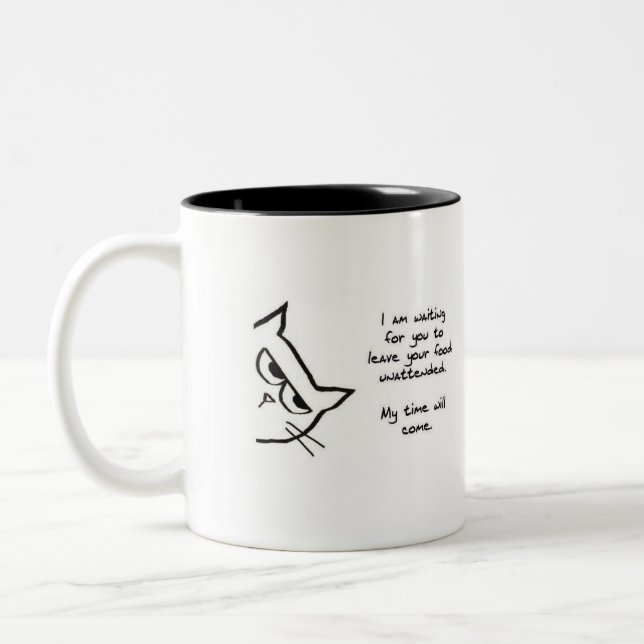 The Cat Waits To Steal Your Food - Funny Cat Mug (Left)