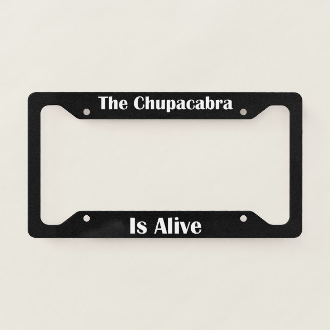 The Chupacabra Is Alive  License Plate Frame (Front)