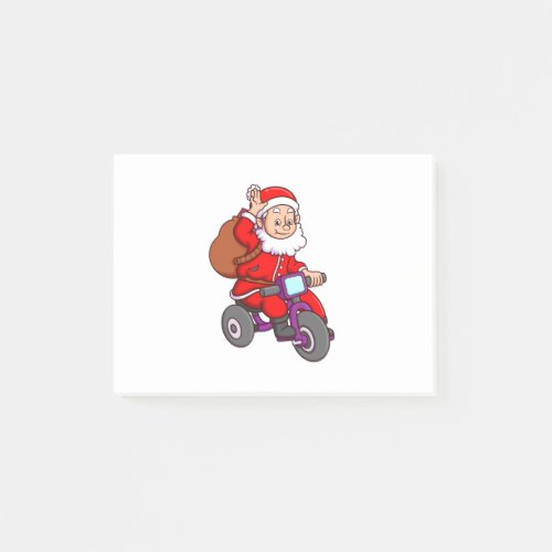 the cute santa claus is riding the bicycle and wav post_it notes