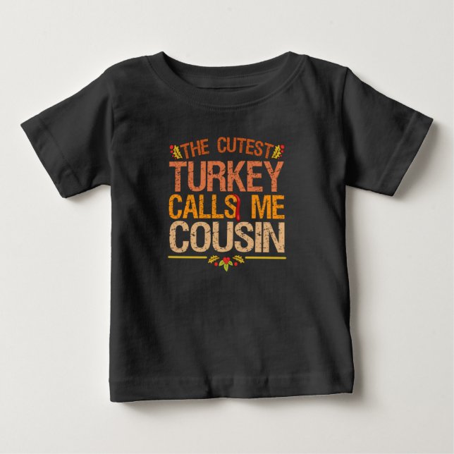 The Cutest Turkey Calls me Cousin Thanksgiving Baby T-Shirt (Front)