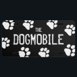 The DOGMOBILE Dog Paw Prints | Customizable License Plate<br><div class="desc">The DOGMOBILE black and white license plate with dog paw prints. Text can be personalized. Add some personality to your car or truck with this dog lover's novelty license plate. Makes a great gift! Visit Jenn's Doodle World for more pet lover's auto accessories and dog themed gifts.</div>