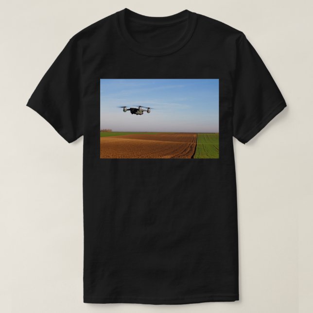 The drone is flying over the plowed field 1 T-Shirt (Design Front)