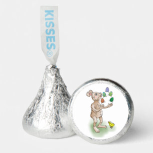 The Easter Bunny juggles with the Easter eggs Hershey®'s Kisses®