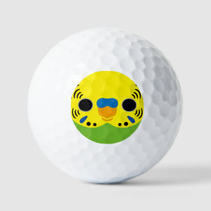 The face of a normal male budgie golf balls