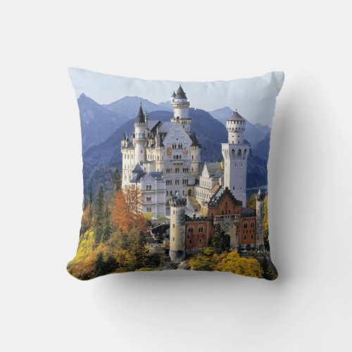 The fanciful Neuschwanstein is one of three Throw Pillow