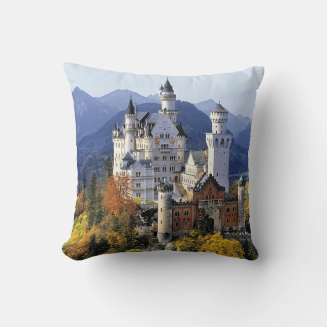 The fanciful Neuschwanstein is one of three Throw Pillow (Front)