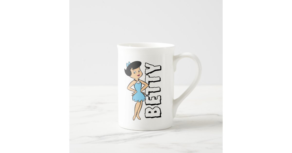 https://rlv.zcache.com/the_flintstones_betty_rubble_bone_china_mug-r1cea3b4067ca438b992753d5dfba8482_kjukc_630.jpg?view_padding=%5B285%2C0%2C285%2C0%5D