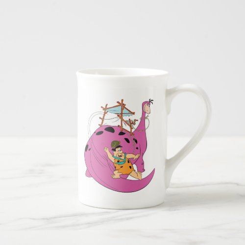 The Flintstones  Fred Sliding Down Tail Bone China Mug