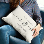 The Future Mr and Mrs Elegant Script Calligraphy Lumbar Pillow<br><div class="desc">Celebrate your love with this chic and romantic throw pillow featuring your future Mr & Mrs family name in charcoal vintage script calligraphy lettering. Choose your own background color under customize further. This would make the perfect gift for a bridal shower, engagement, or Valentine's Day. The grey and ivory tones...</div>