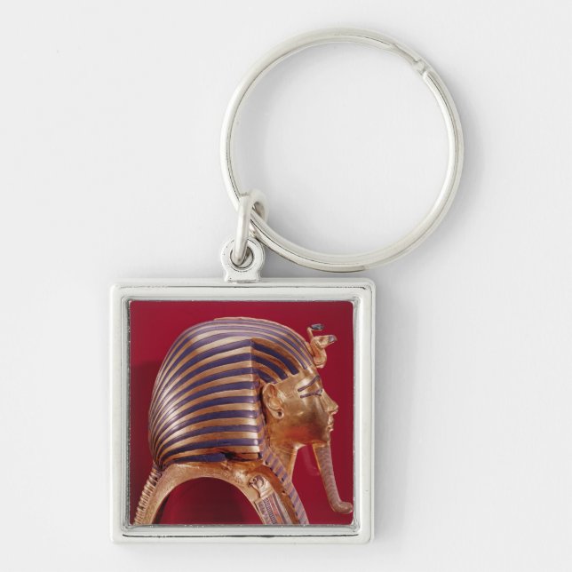 The gold mask, from the Treasure of Keychain (Front)