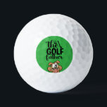 The Golf Father: Bold & Playful Design Golf Balls<br><div class="desc">A striking design featuring the words "the GOLF father" in bold black lettering against a rich green backdrop, seamlessly blending sophistication with humor. Above the text, a small golf ball graphic adds a nod to the sport, while below, a charming cartoon dog with perked-up ears and a joyful expression brings...</div>