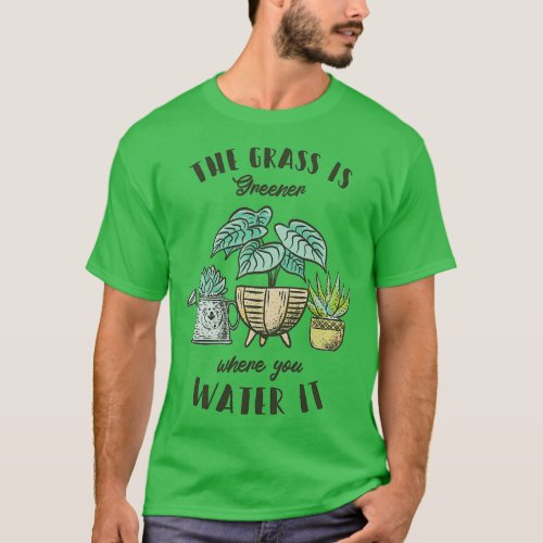 The grass is greener where you water it T_Shirt