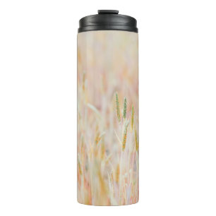 THE GRASSLAND WAS TURNED INTO PASTEL-COLORED BY HE THERMAL TUMBLER