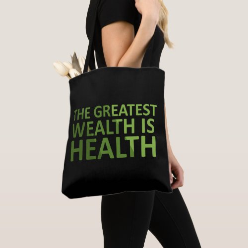 The greatest wealth is health tote bag