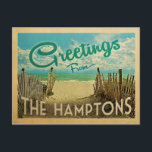 The Hamptons Beach Vintage Travel Postcard<br><div class="desc">This Greetings From The Hamptons vintage postcard design features a sandy beach with a beautiful turquoise ocean water and above the sea,  a blue sky with billowy white clouds. In vintage travels style.</div>